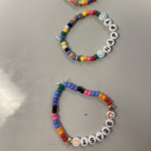 Bracelets made during the 3rd grade market day project.